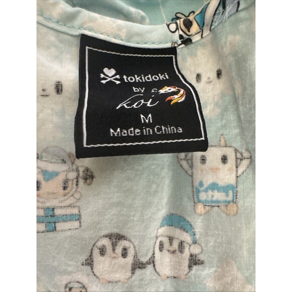 Tokidoki by Koi Womens Medium Blue Cartoon Print Scrub Top Pockets Medical Nurse - Picture 15 of 16